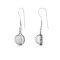 Silver earrings dominate the jewellery